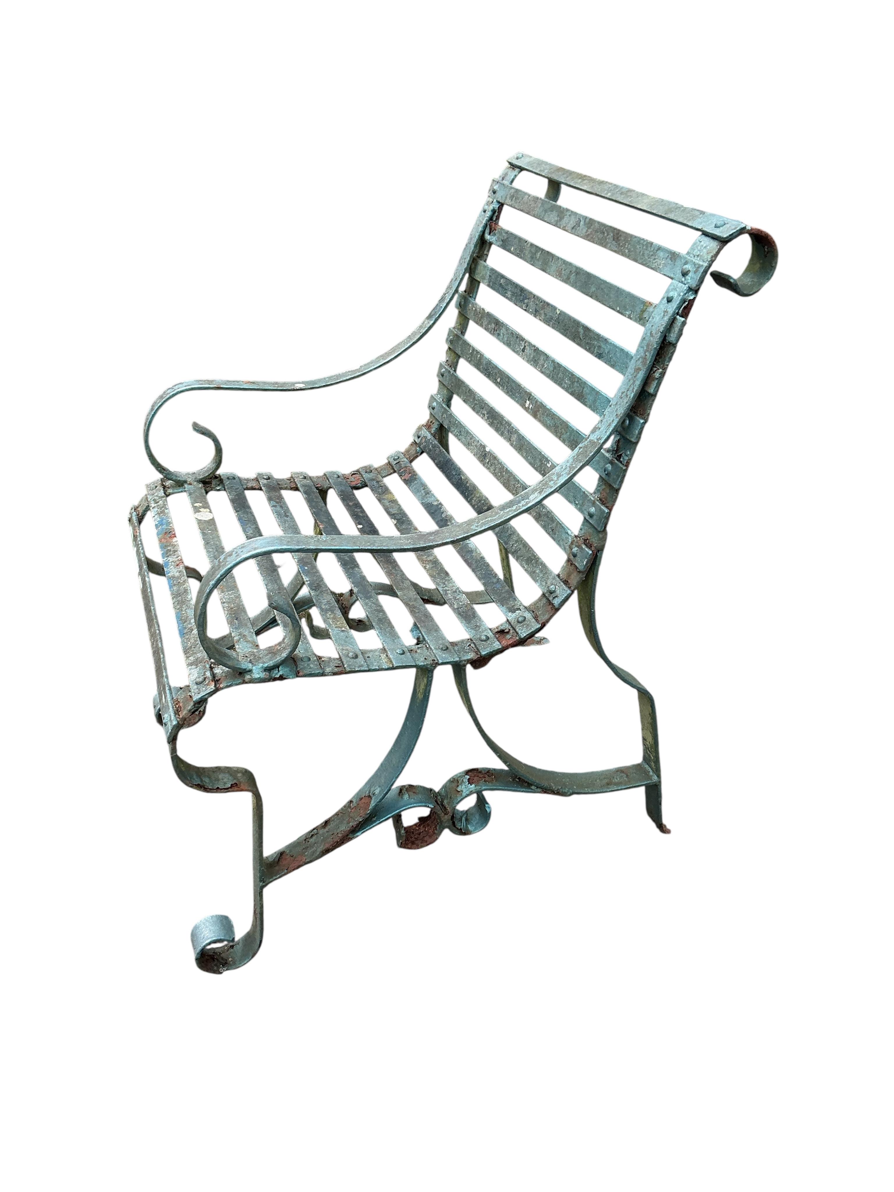 A pair of Victorian painted, wrought iron garden chairs, width 56cm, depth 74cm, height 84cm